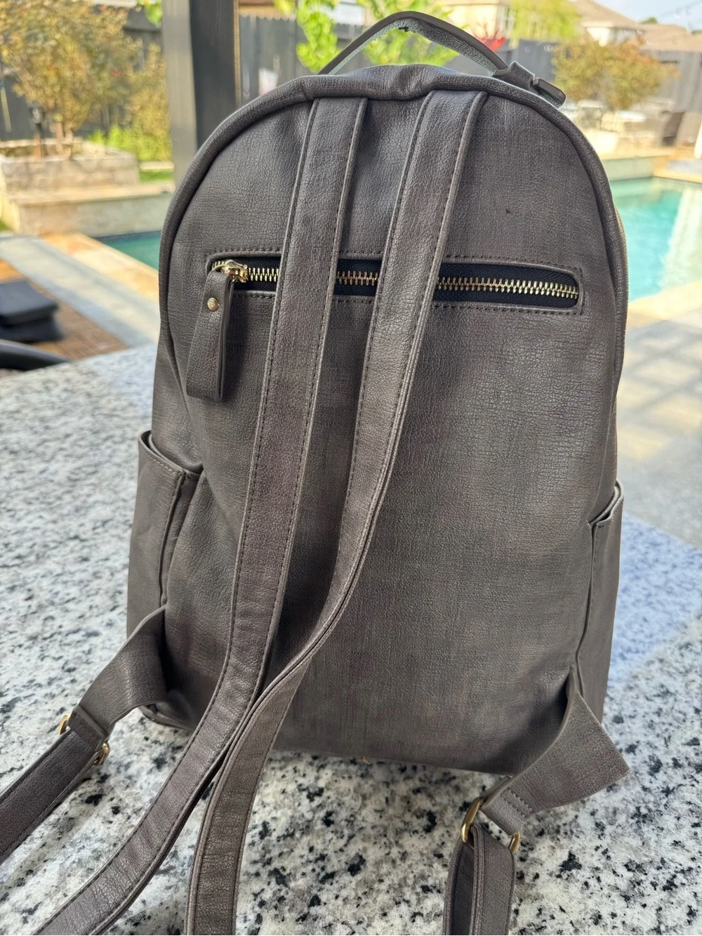 MMS Design Studio gray faux leather backpack